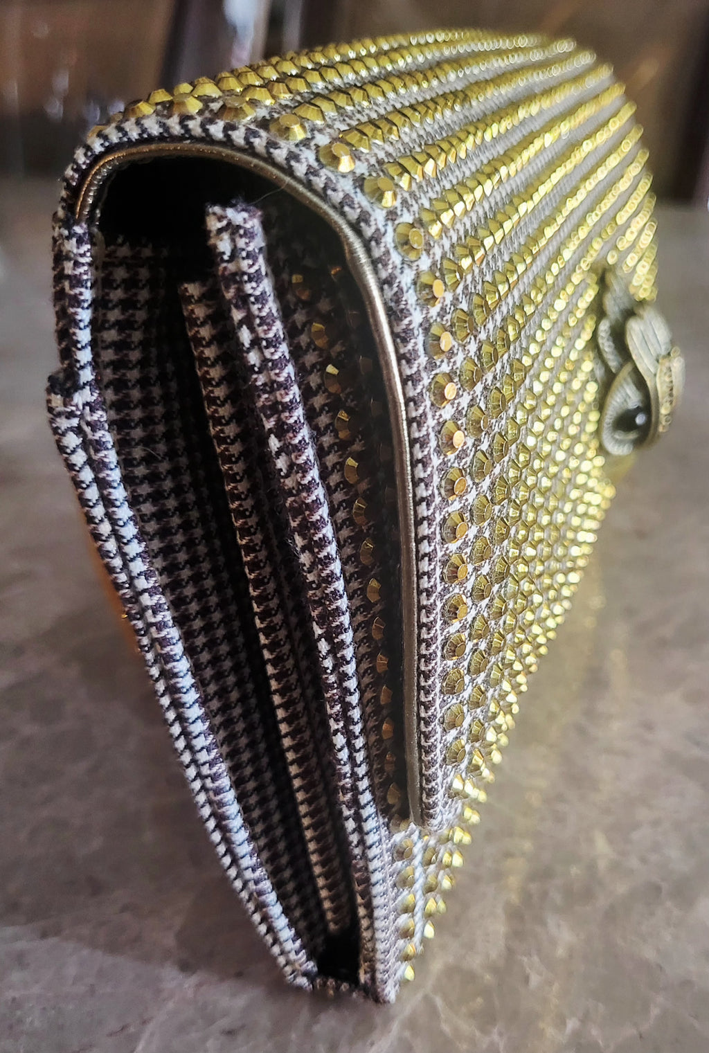 Kurt Geiger London Kensington Gold Studded Houndstooth Eagle Clutch.