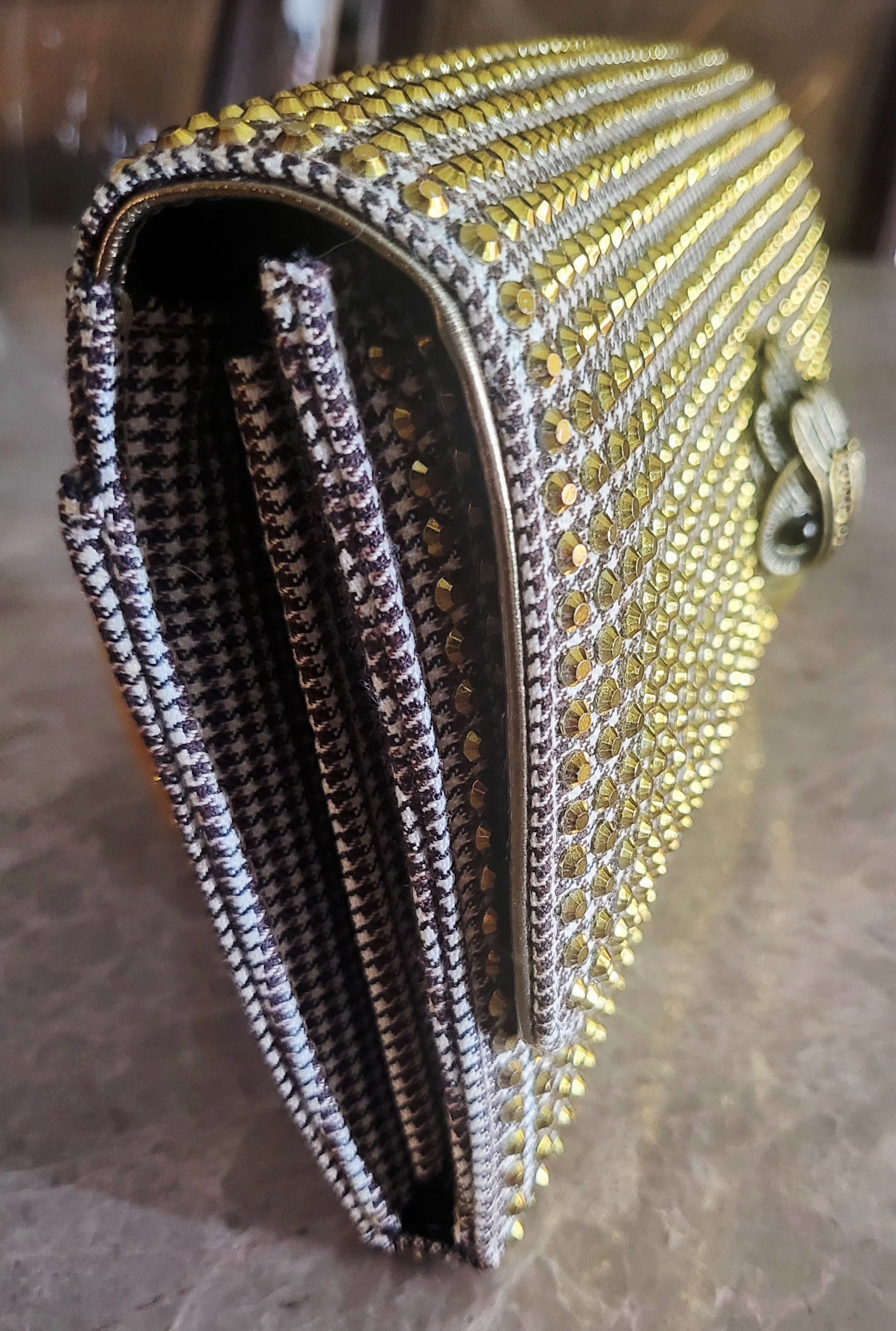 Kurt Geiger London Kensington Gold Studded Houndstooth Eagle Clutch.