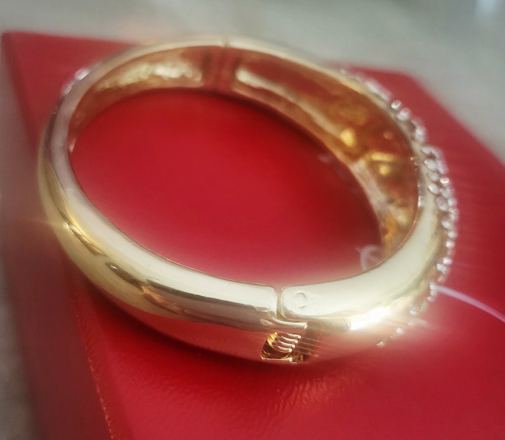 14kt Yellow Gold Plated Bangle w/ Crystal embellishments.