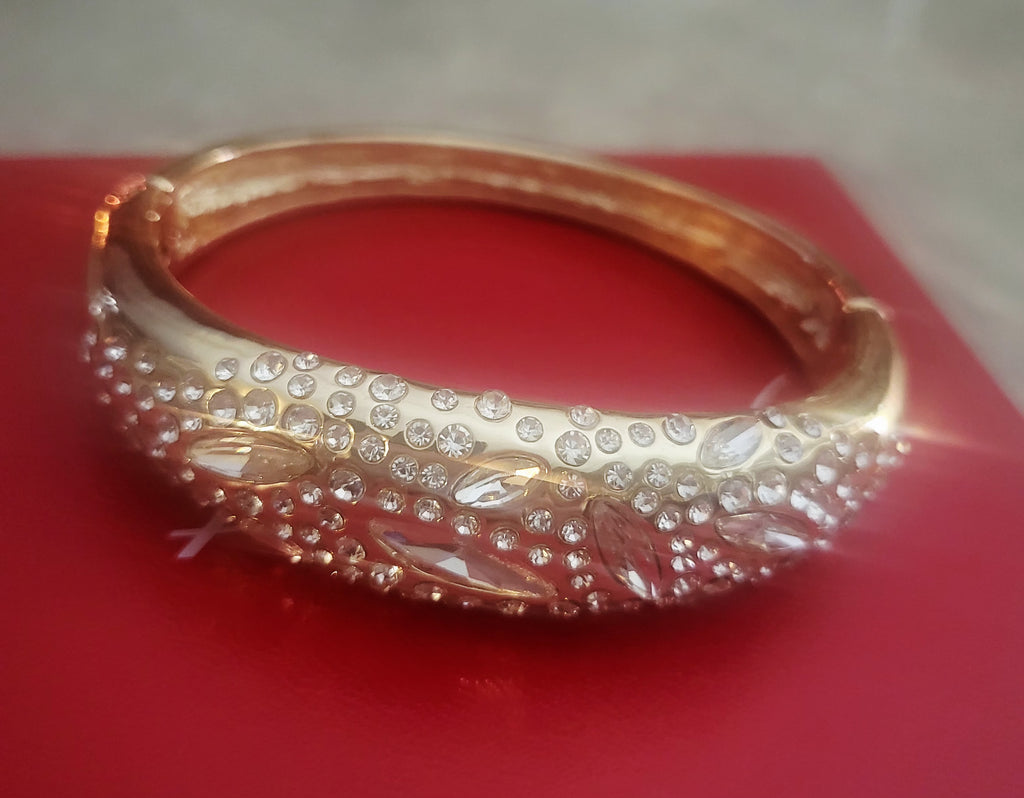 14kt Yellow Gold Plated Bangle w/ Crystal embellishments.