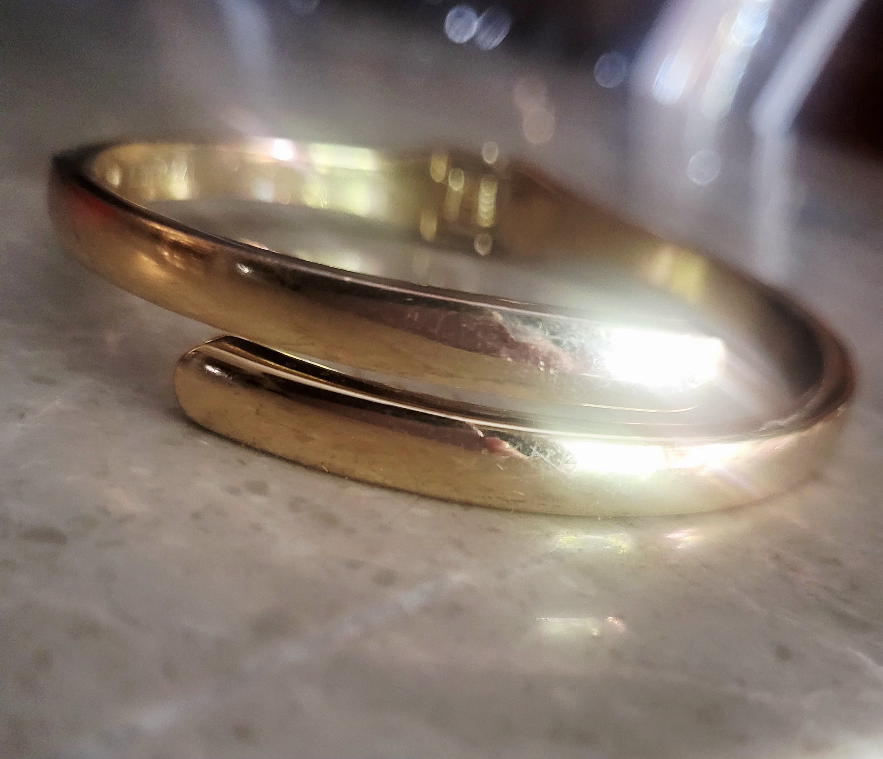 14kt yellow gold plated Minimalist high polish By-pass Bangle.