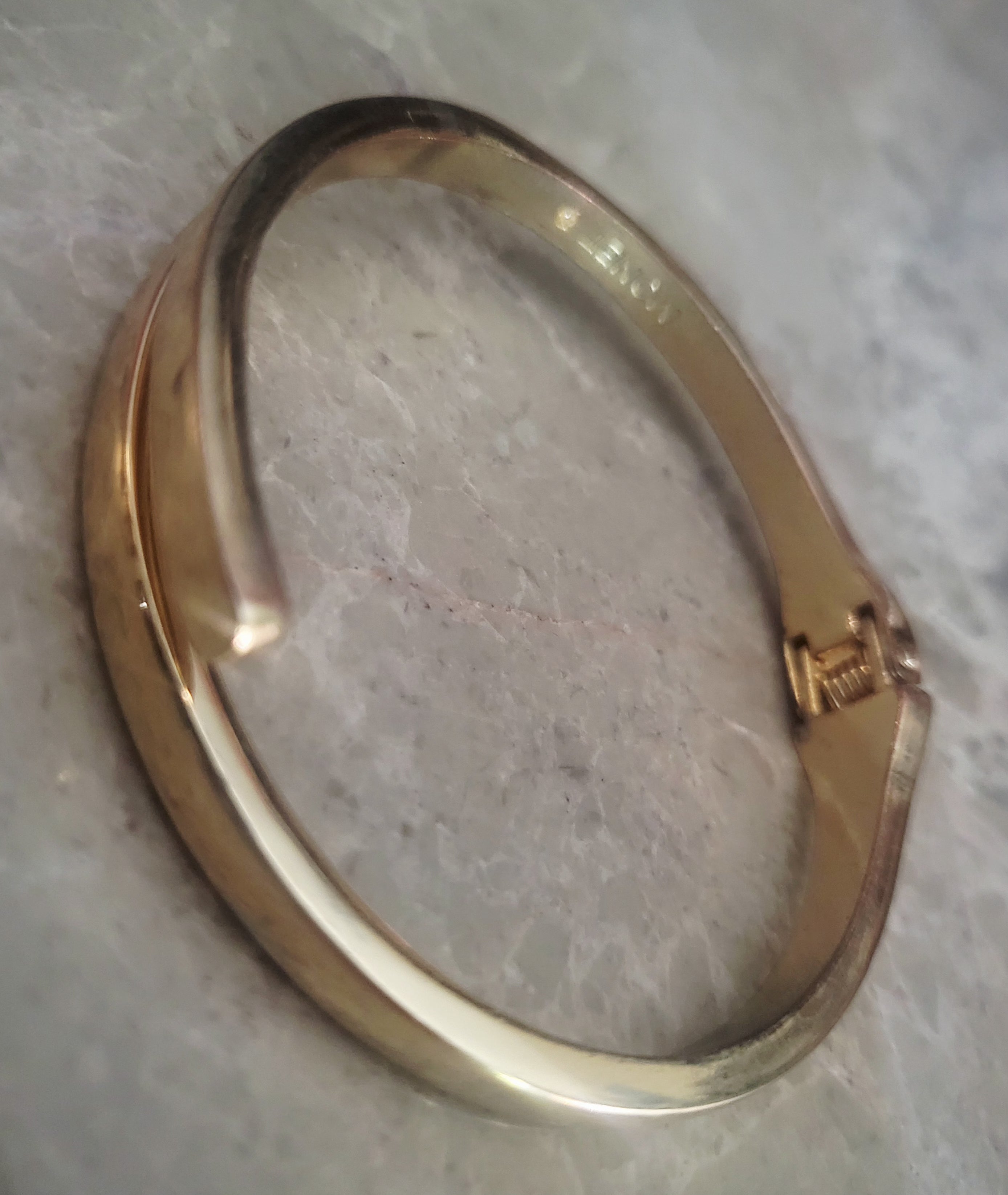 14kt yellow gold plated Minimalist high polish By-pass Bangle.