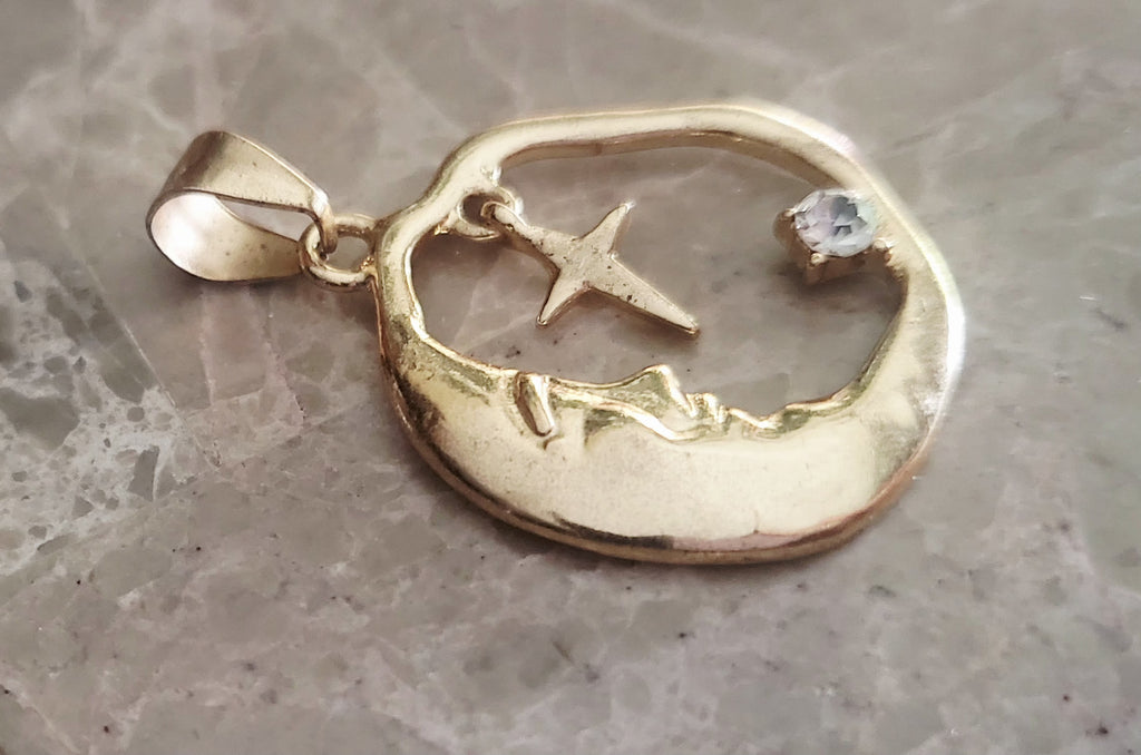 14kt yellow gold plated Moon & Star Pendant.
