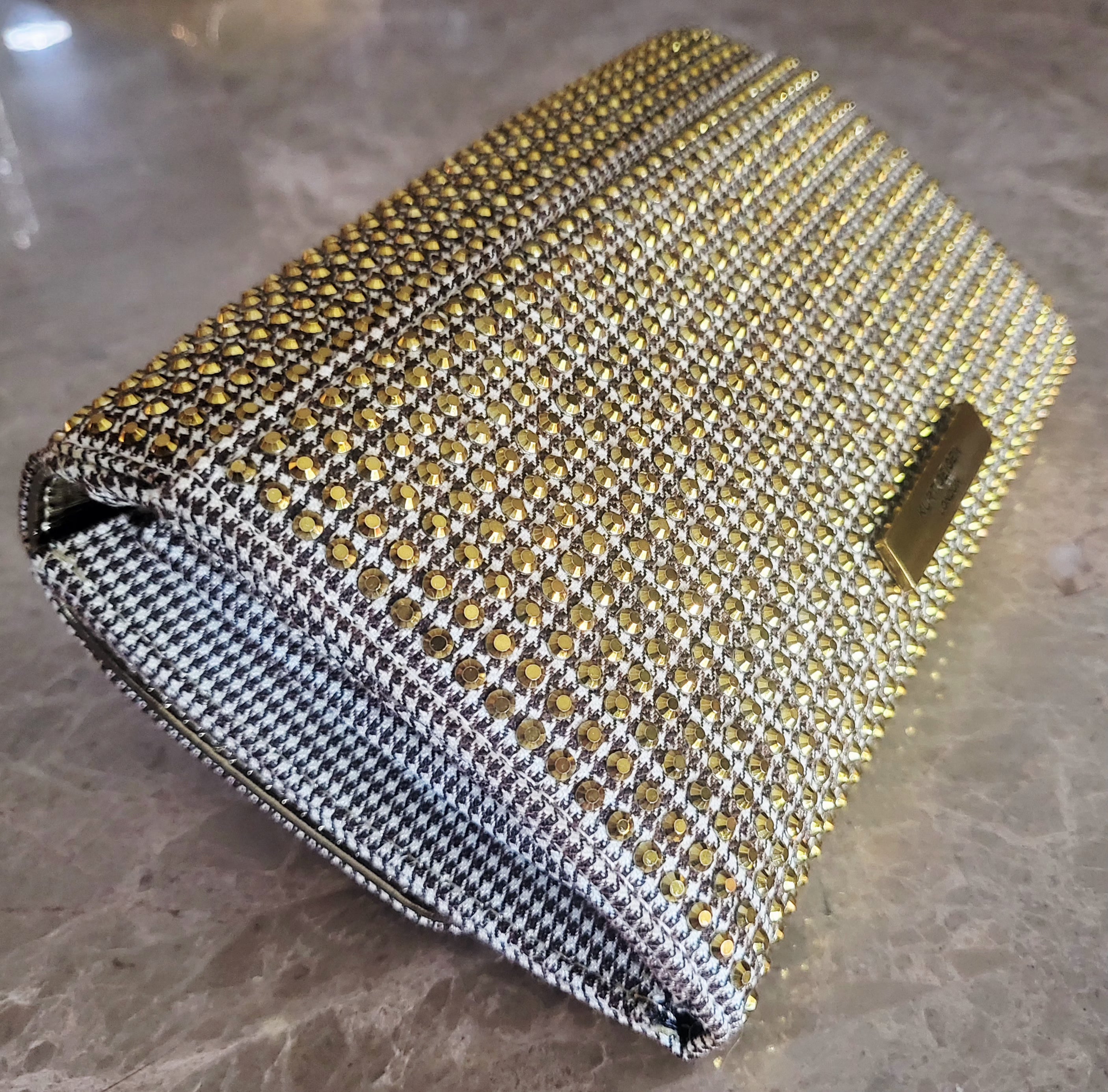 Kurt Geiger London Kensington Gold Studded Houndstooth Eagle Clutch.