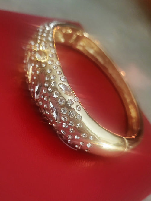 14kt Yellow Gold Plated Bangle w/ Crystal embellishments.