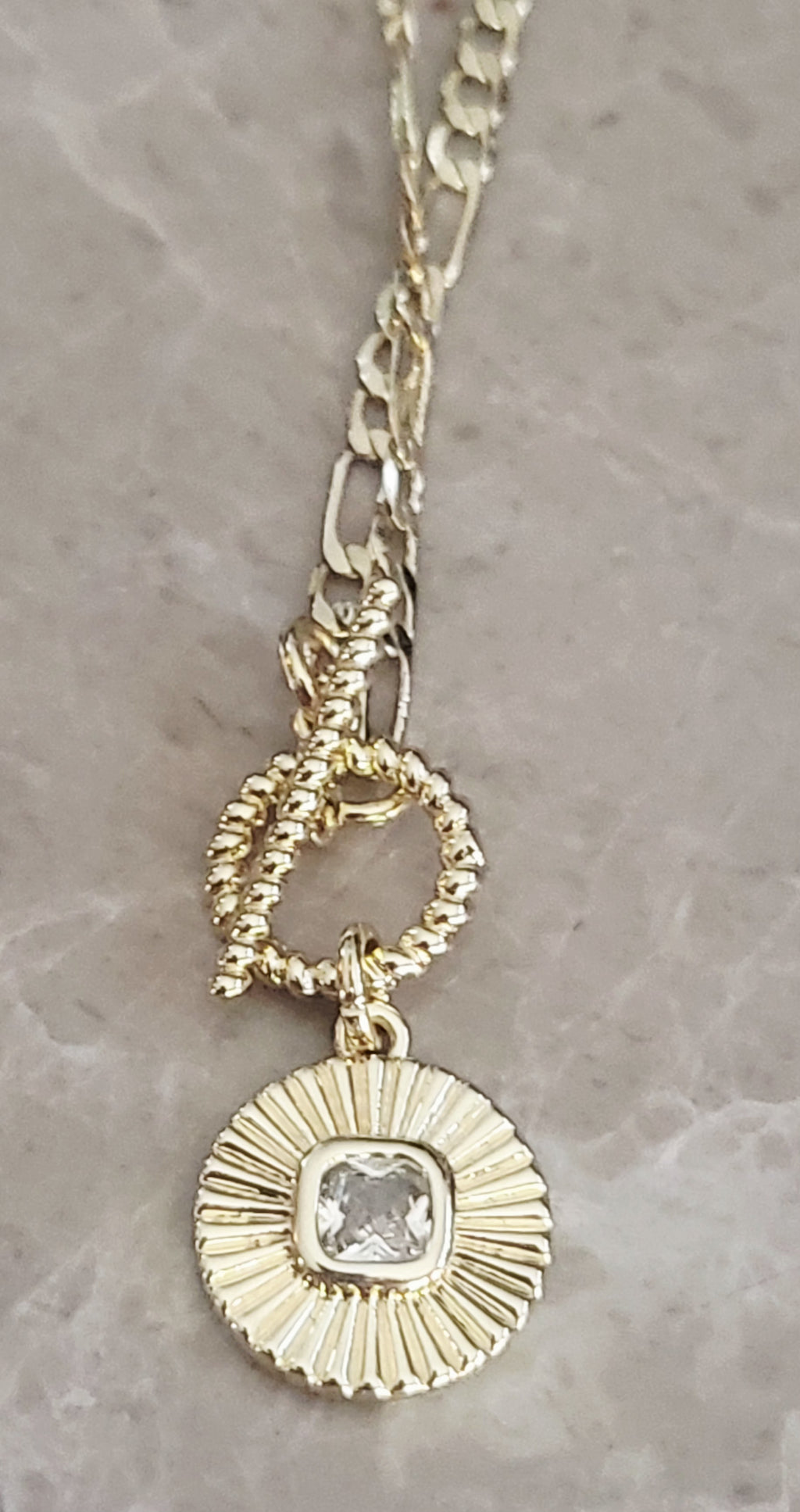 14kt yellow gold plated Crystal round circular pendant necklace.