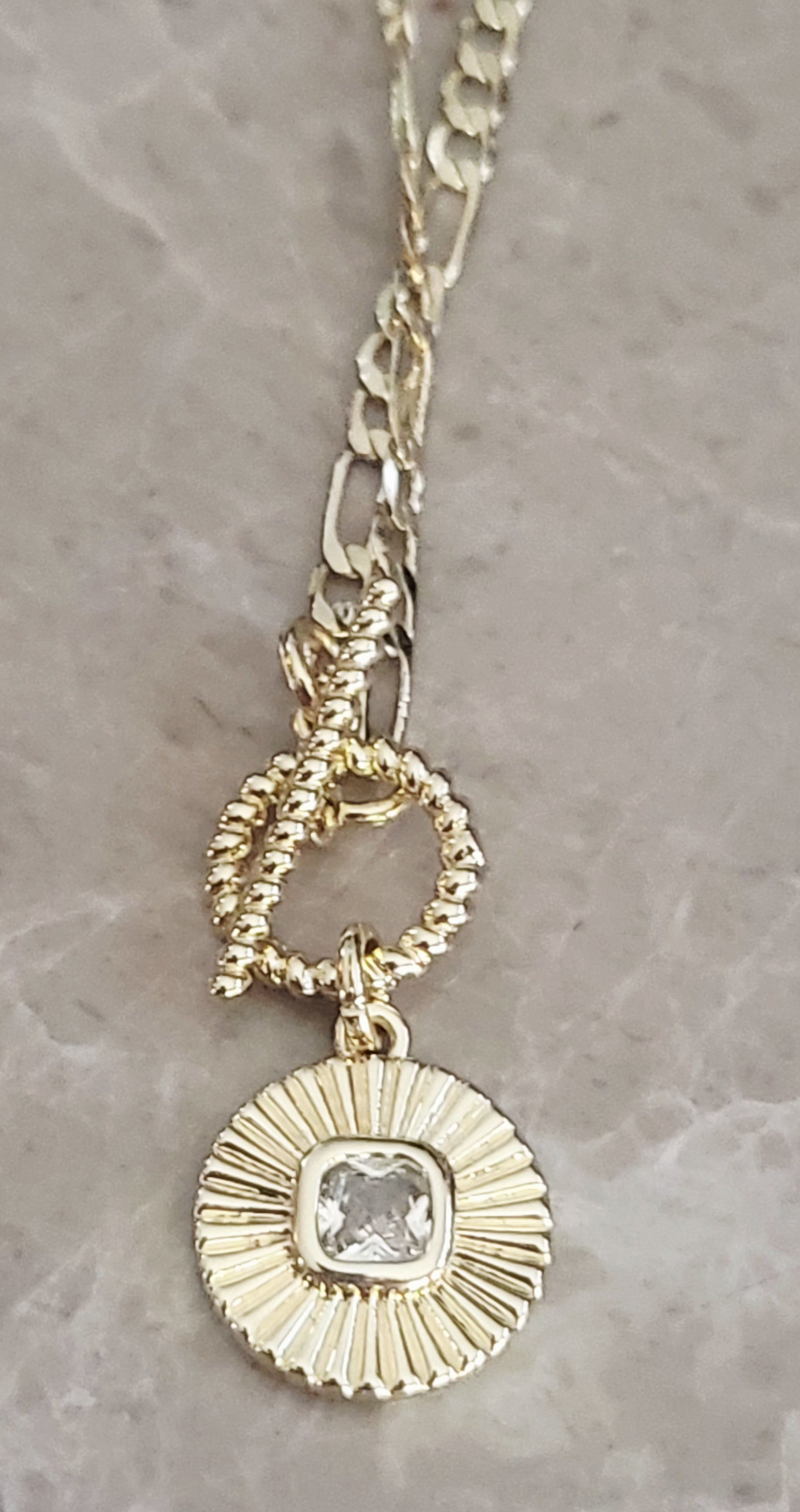 14kt yellow gold plated Crystal round circular pendant necklace.