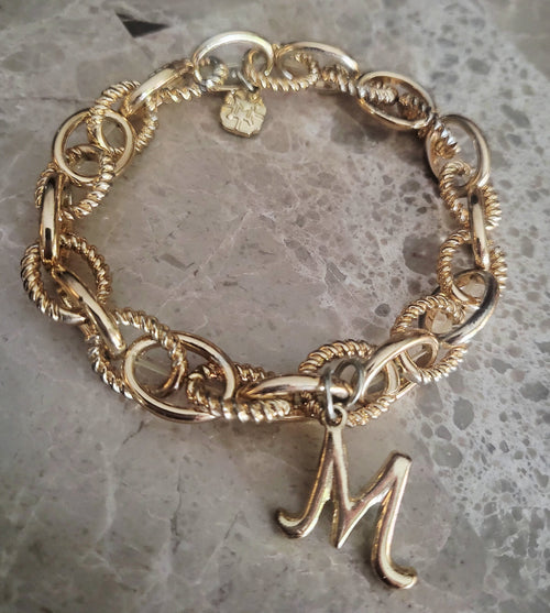 14 karat yellow gold plated Link Bracelet initial "M" or "W"
