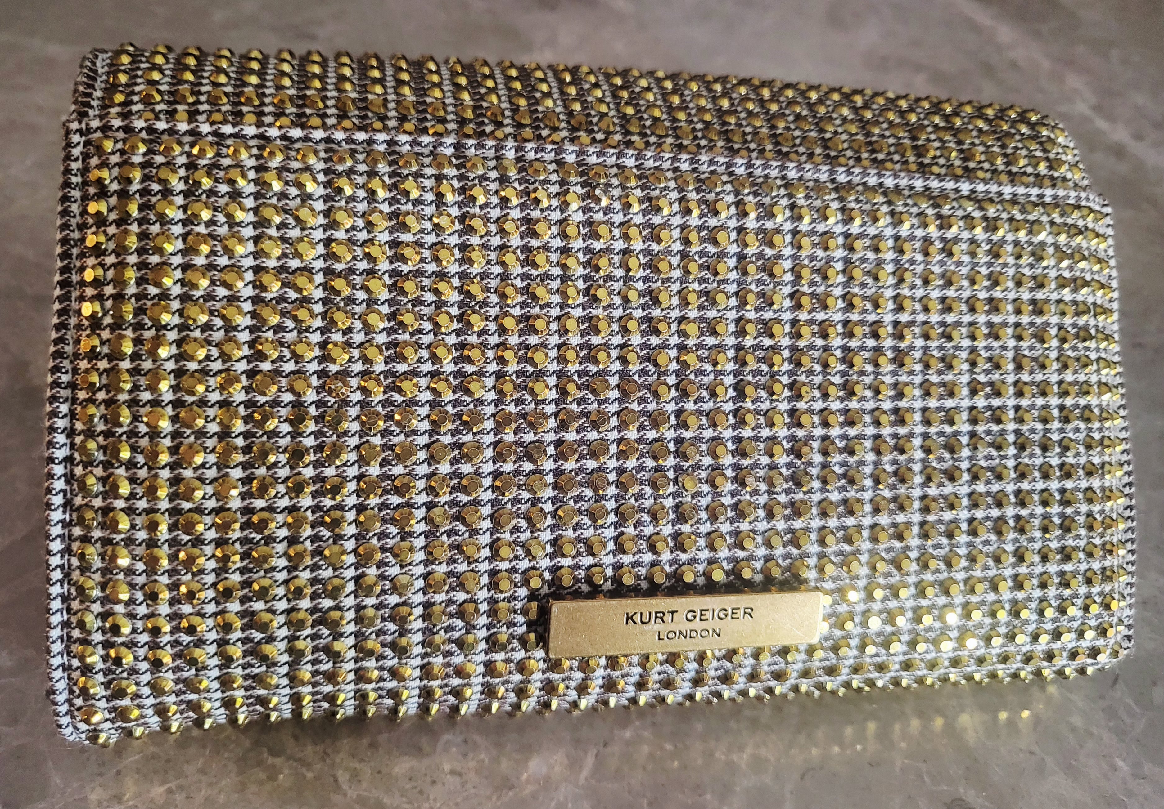 Kurt Geiger London Kensington Gold Studded Houndstooth Eagle Clutch.