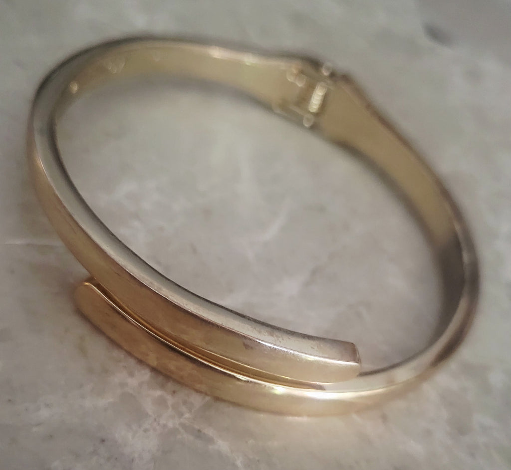 14kt yellow gold plated Minimalist high polish By-pass Bangle.