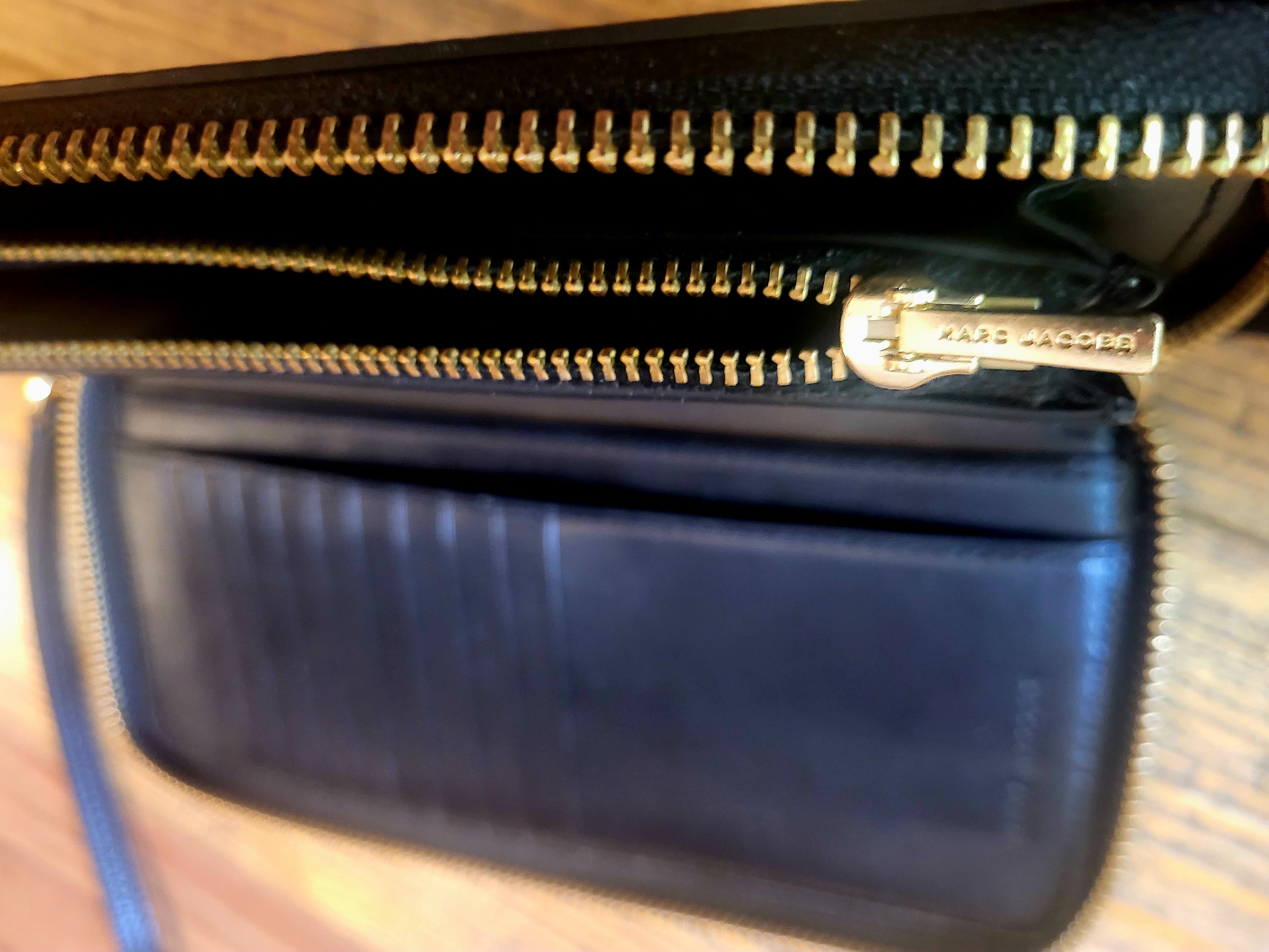 Marc Jacobs The Wallet Black Leather Zip-Around Continental Wristlet Wallet.