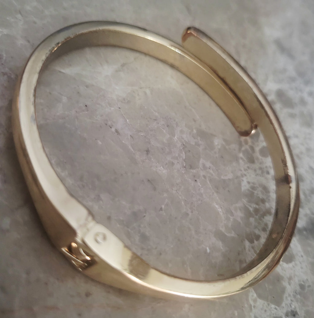 14kt yellow gold plated Minimalist high polish By-pass Bangle.